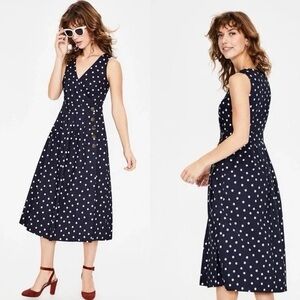Boden size 4, navy with white  polka dot, brown buttons